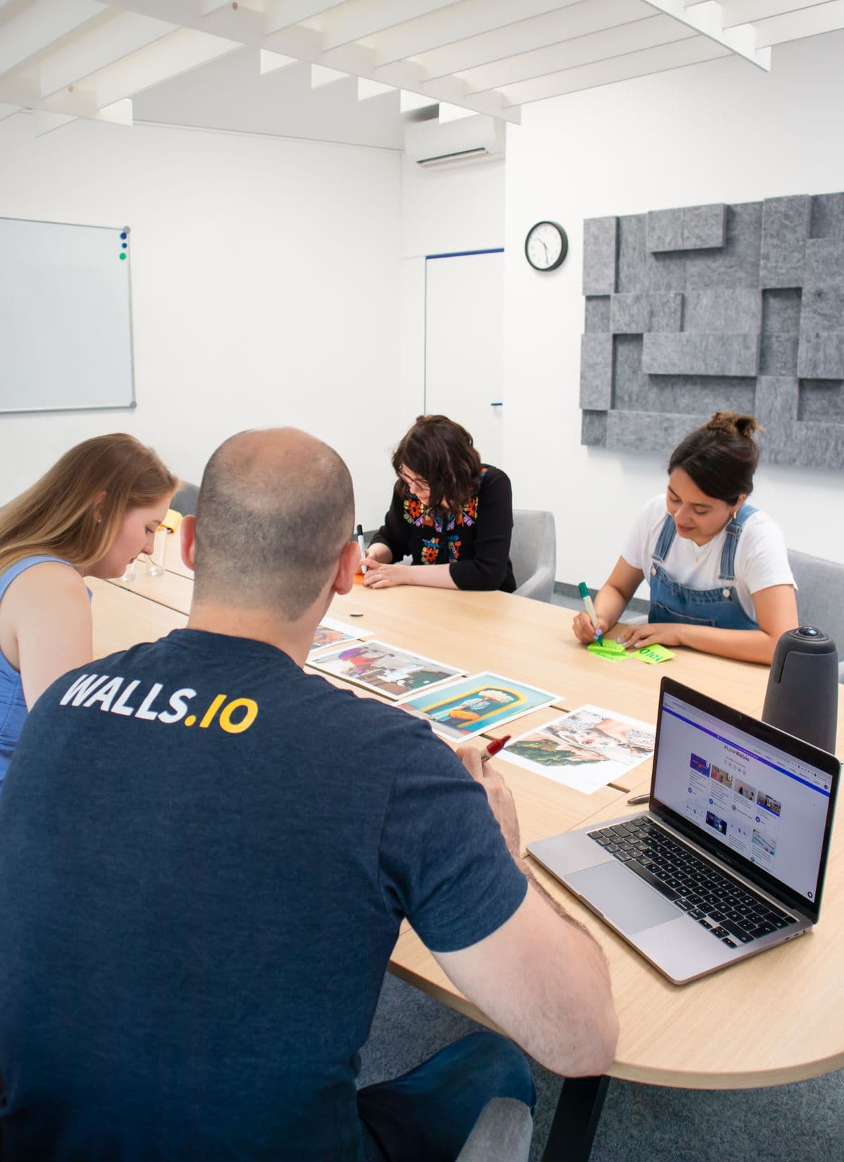 A team planning marketing work in a conference room