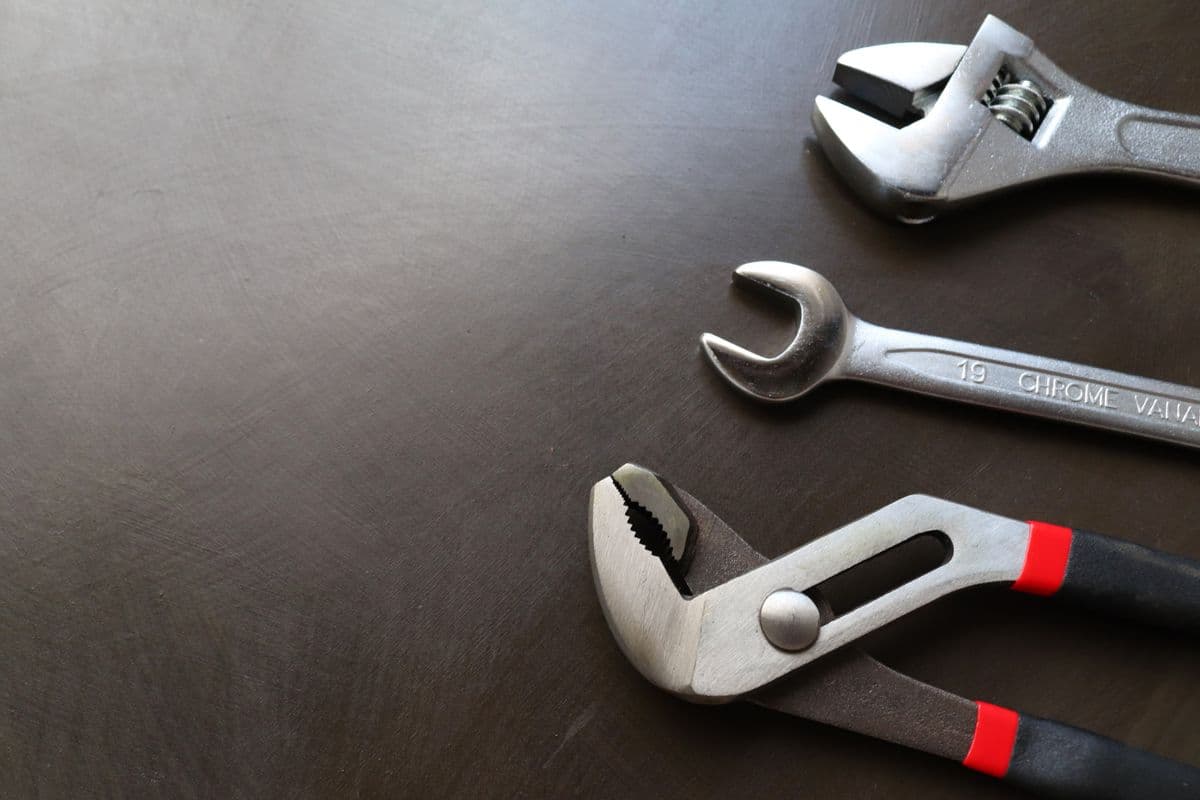 Wrenches and pliers arranged for repair work